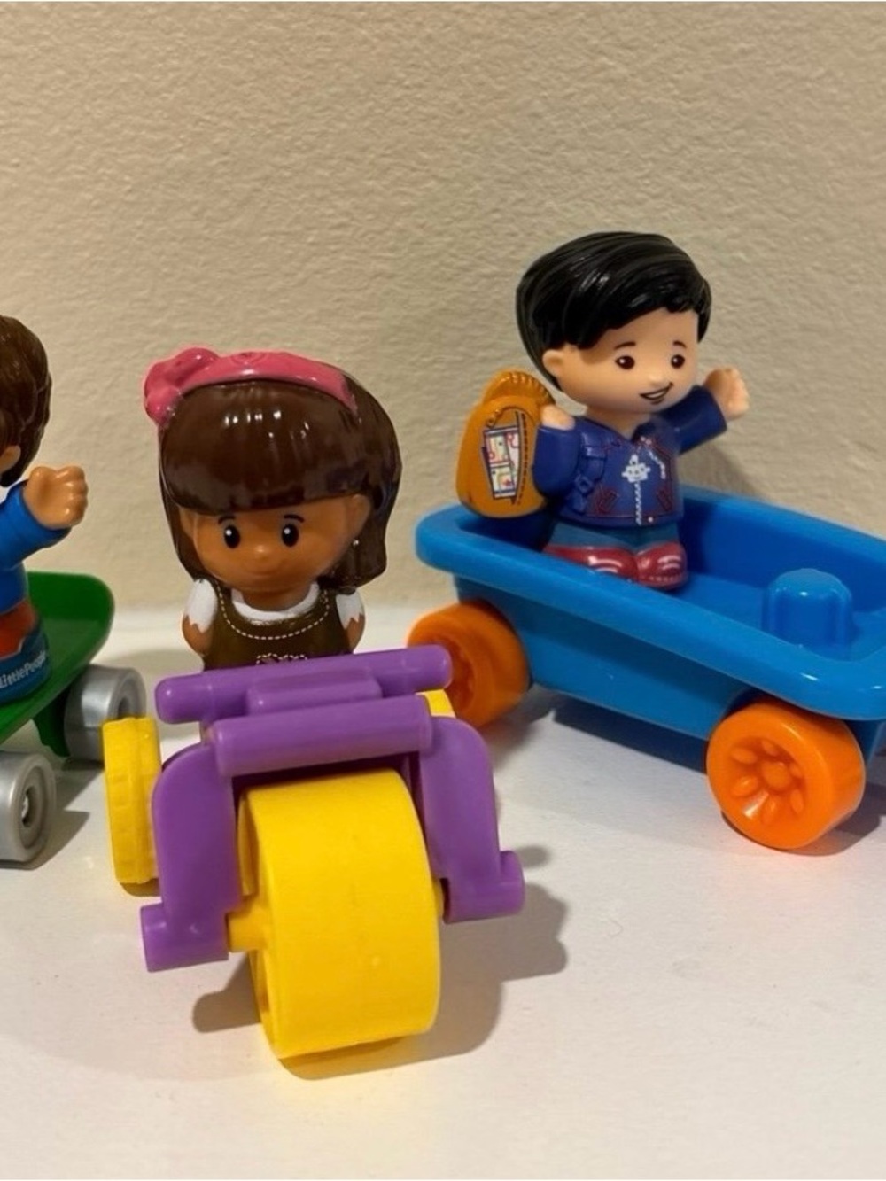 Fisher-Price Small Figure Playset with Blue Wagon, Purple Trike and Yellow Wheel